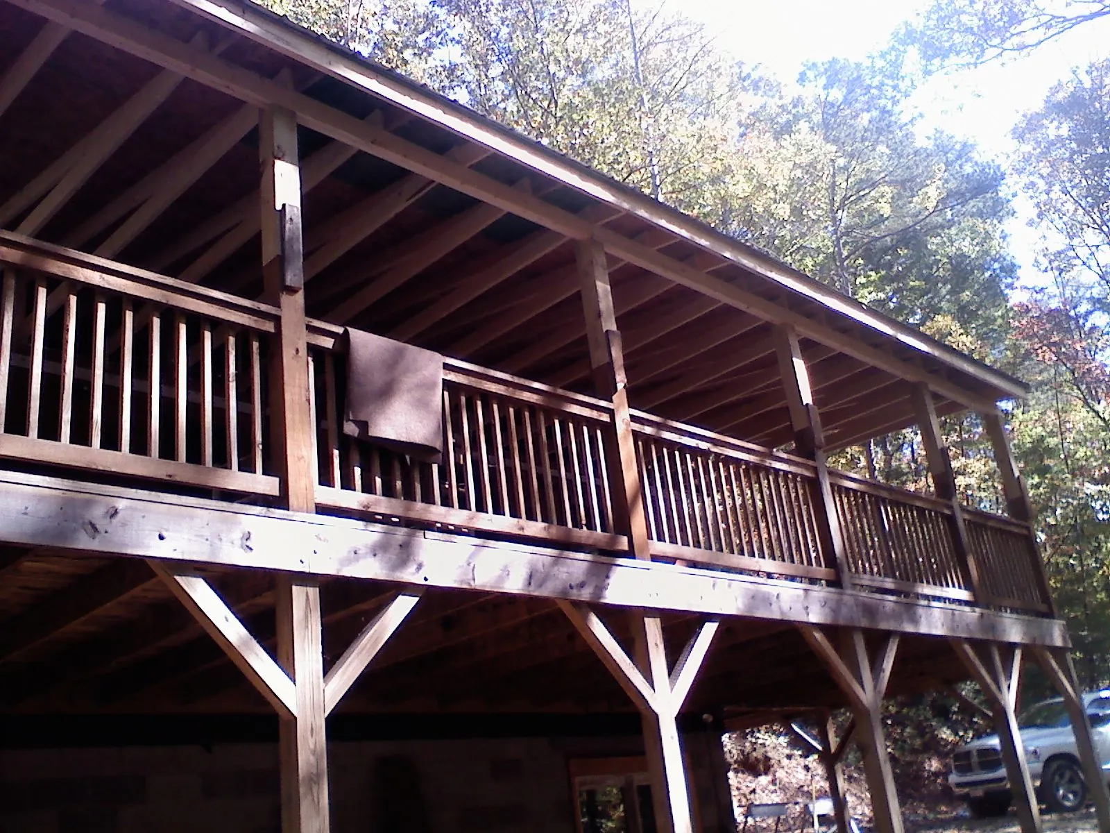 Timber framing under a new elevated porch and deck — Roof Leak Repair in North Judson by Roofing Brothers